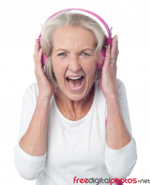 Elderly woman with headphones